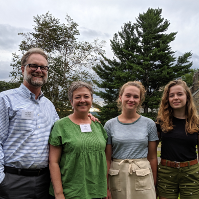 Parents and two daughters on New England campus